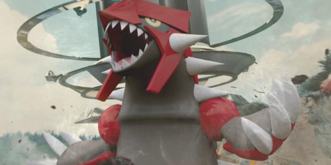 Close up of Groudon from Pokemon with a Pokemon Go Raid in the background