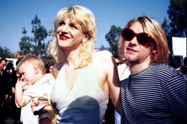 Opposite page: Promotio<em></em>nal photos of Nirvana in three-piece mode with Kurt Cobain, bassist Krist Novoselic and drummer Dave Grohl. Above: Baby Francis Bean with Courtney Love and Kurt Cobain at the 1993 MTV Awards. Pice: Vinnie Zuffante