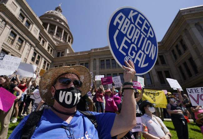 FILE - Abortion rights demo<em></em>nstrators attend a rally at the Texas state Capitol in Austin, Texas, May 14, 2022. A Texas judge ruled Friday, Aug. 4, 2023, the state’s abortion ban has proven too restrictive for women with serious pregnancy complications and must allow exceptions without doctors fearing the threat of criminal charges. The challenge is believed to be the first in the U.S. brought by women who have been denied abortions since the Supreme Court last year overturned Roe v. Wade, which for nearly 50 years had affirmed the co<em></em>nstitutional right to an abortion. (AP Photo/Eric Gay, File)