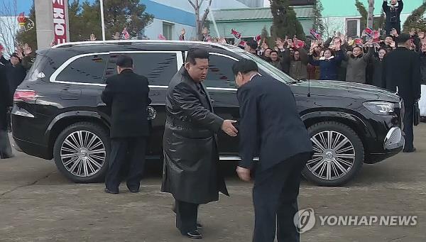 This image, captured from footage of North Korea's state-run Korean Central Television on Jan. 15, 2024, shows the North's leader Kim Jong-un emerging from what appears to be a Mercedes-Benz SUV. (For Use o<em></em>nly in the Republic of Korea. No Redistribution) (Yonhap)