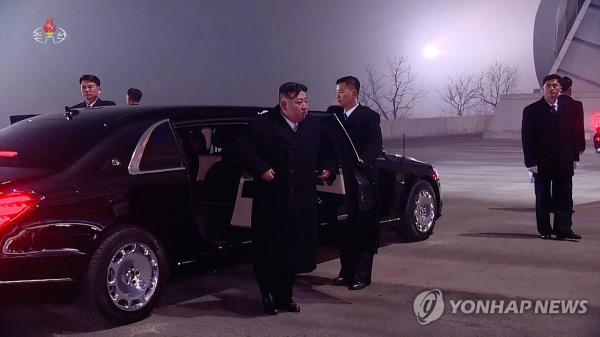 This file image, captured from footage of North Korea's state-run Korean Central Television on Jan. 1, 2024, shows the North's leader getting out of a Mercedes-Benz vehicle to attend a performance celebrating the new year. (For Use o<em></em>nly in the Republic of Korea. No Redistribution) (Yonhap)