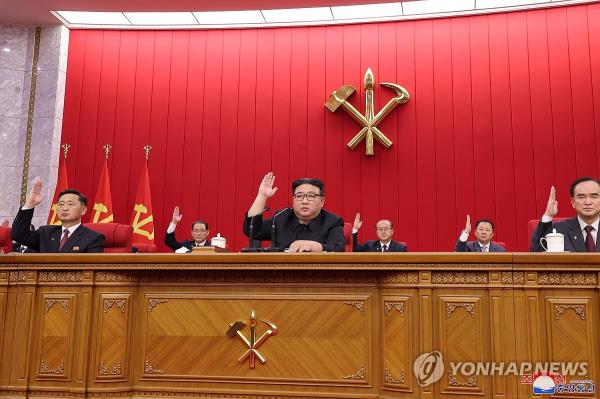 North Korean leader Kim Jong-un (C) attends the 19th enlarged meeting of the political bureau of the eighth Central Committee of the Workers' Party, in this undated photo released by the North's official Korean Central News Agency on Jan. 25, 2024. The North held the meeting from Jan. 23-24 to co<em></em>nfirm and clarify an epochal milestone in the development of regio<em></em>nal industry, the KCNA said. (For Use o<em></em>nly in the Republic of Korea. No Redistribution) (Yonhap)