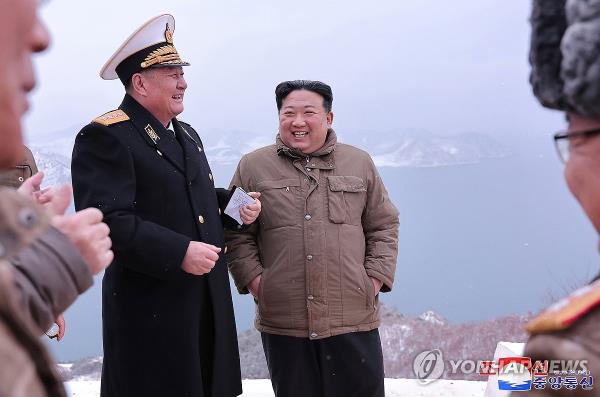 This photo, carried by North Korea's official Korean Central News Agency on Jan. 29, 2024, shows the North's leader Kim Jong-un (C) overseeing the country's test-fire of submarine-launched cruise missiles the previous day. (For Use o<em></em>nly in the Republic of Korea. No Redistribution) (Yonhap)