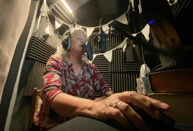 Jennifer March records her podcast, “Not Your Mother’s Storytime”, at her home studio in Petaluma on Thursday, June 15, 2023.  (Christopher Chung/The Press Democrat)