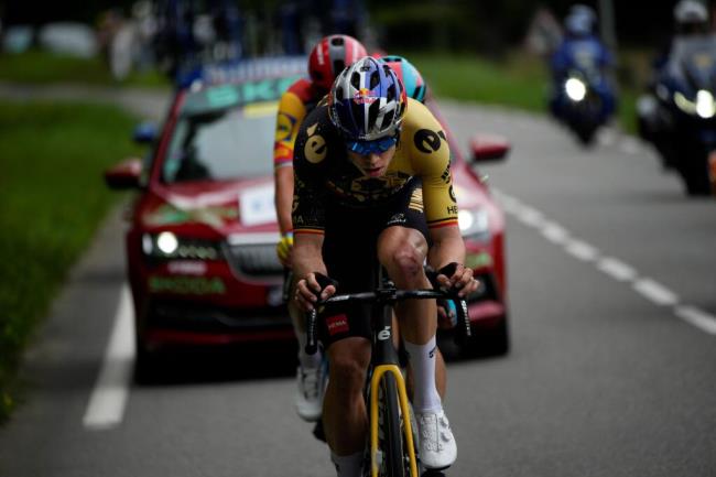 Belgium's Wout Van Aert, Belgium's Victor Campenaerts, and Denmark's Mads Pedersen, from front to rear, ride breakaway during the fifth stage of the Tour de France cycling race over 163 kilometers (101 miles) with start in Pau and finish in Laruns, France, Wednesday, July 5, 2023. (AP Photo/Daniel Cole)