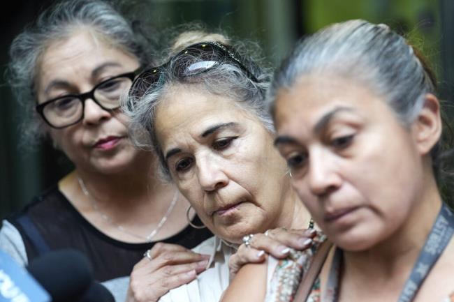 Rudy Farias' aunts, from left, Sylvia Sanchez Lopez, Pauline Sanchez and Michelle Sanchez speak outside Houston Police headquarters after HPD Chief Troy Finner gave an update on the Farias case, Thursday, July 6, 2023 in Houston. Farias, who was reported missing as a teenager in 2015, returned home the next day but he and his mother deceived officers by giving false names over the ensuing eight years, police said Thursday. (Brett Coomer/Houston Chro<em></em>nicle via AP)