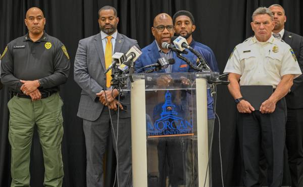 Morgan State University President David Wilson announced a $9,000 reward for information leading to an arrest of the two shooters. He was joined by (L to R) Morgan State Police Chief Lance Hatcher, City Council President Nick Mosby, Baltimore Mayor Brandon Scott and Baltimore Police Commissio<em></em>ner Richard Worley.