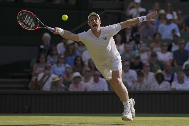 Britain's Andy Murray returns to Stefanos Tsitsipas of Greece in a men's singles match on day five of the Wimbledon tennis champio<em></em>nships in London, Friday, July 7, 2023. (AP Photo/Alberto Pezzali)