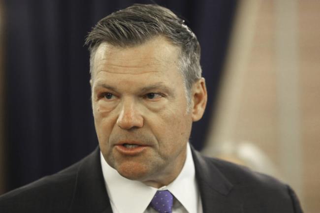 Kansas Attorney General Kris Kobach answers questions during a news co<em></em>nference a<em></em>bout a new state law that defines male and female in state law so that transgender people can't change their driver's licenses and birth certificates to reflect their gender identities, Monday, June 26, 2023, at the Statehouse in Topeka, Kansas. The number of people making those changes jumped more than 300% this year ahead of the new law taking effect. (AP Photo/John Hanna)